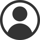 A simple black and white user profile icon with a circle outline containing the silhouette of a person on a light gray background.